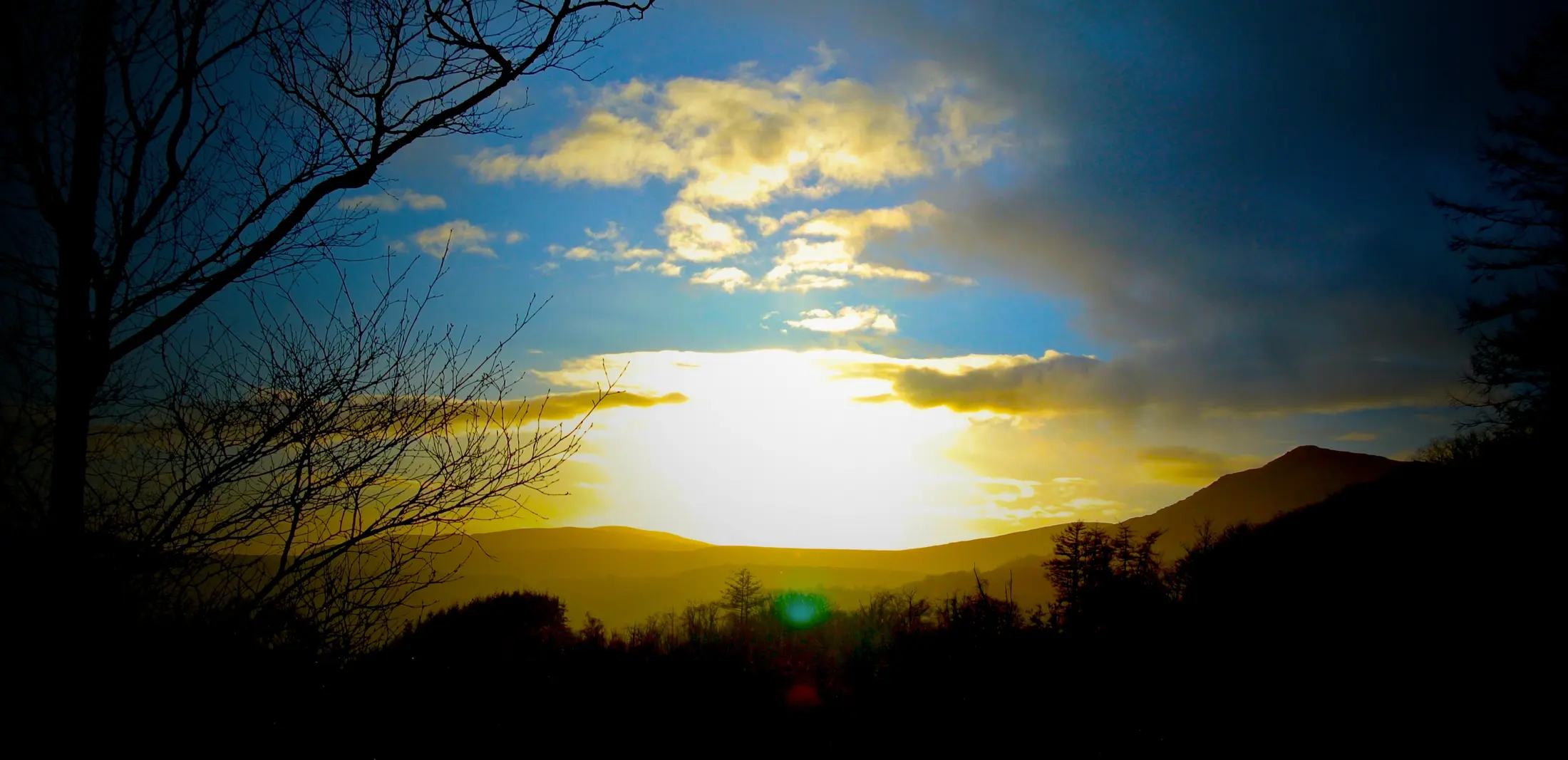 Sun rising over the Cumbrian fells as seen from Cowran Estate